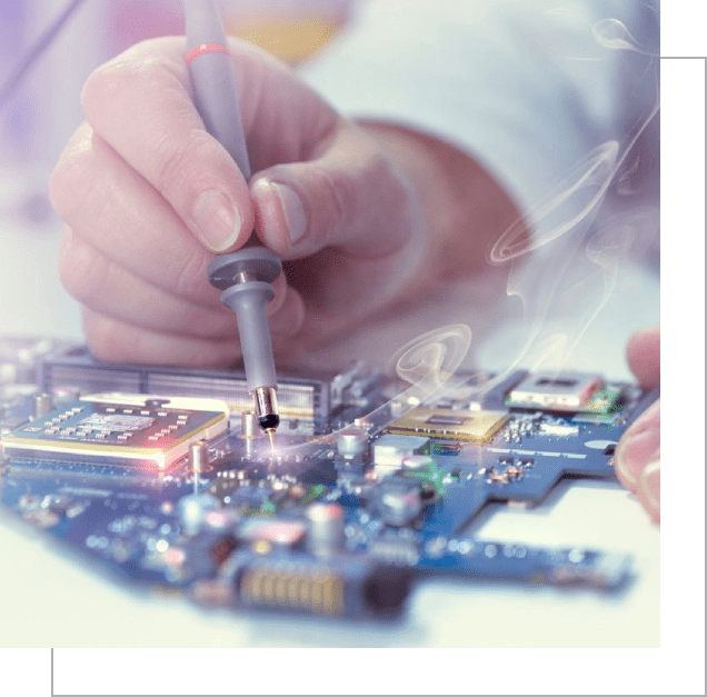 A person working on a computer board